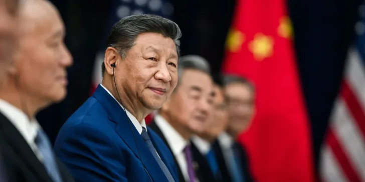 XI